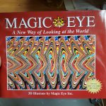 Magic Eye Puzzles book cover. Cover has a magic eye puzzle and the words, "Magic Eye, a new way of looking at the world."